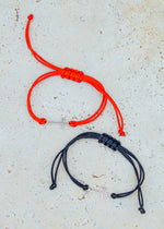 CROSS SILHOUETTE CORD BRACELET